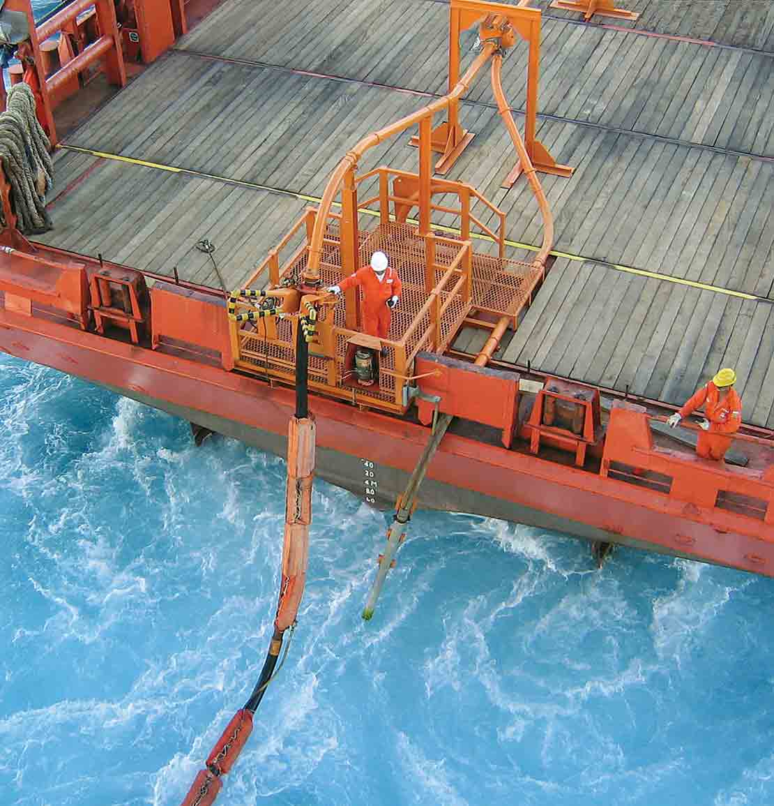 Offshore cuttings skips and vacuum pump